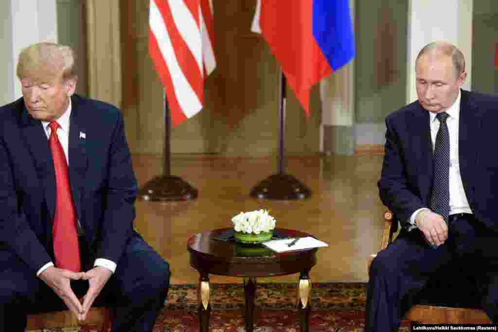 U.S. President Donald Trump (left) meets with Russian President Vladimir Putin in Helsinki on July 16. (Lehtikuva via Reuters/Heikki Saukkomaa)