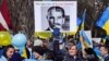 Сталін і Путін – як одне обличчя на плакаті. Демонстрація проти війни Росії проти України. Вашингтон, США. 6 березня 2014 року