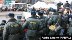 Police monitor the protest in Moscow