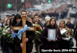 A mourning procession is held for Oliver Ivanovic in Mitrovica, northern Kosovo, on January 17.
