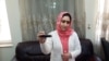 Radio Azadi journalist Nazeefa Mahboobi displays the award she received from local NGOs for her investigative reporting.
