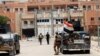 Iraqi security forces gather in center of Fallujah on June 20. 