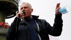Belarusian oppositionist Mikalay Statkevich talks to supporters at a protest rally in Minsk in May 2020. 