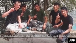 A screen grab from a video that purportedly shows the men who attacked foreign cyclists in Tajikistan.