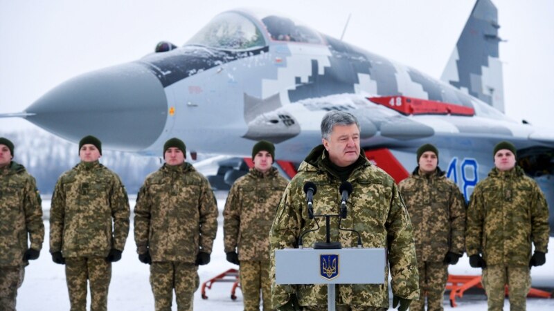 Порошенко бара Германија да ја одврати Русија од агресија врз Украина