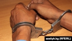 Kyrgyzstan - handcuffs, crime, undated
