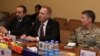 Acting Pentagon chief Patrick Shanahan (center) takes part in a meeting next to General Scott Miller (right), commander of U.S. and NATO forces in Afghanistan, and U.S. Ambassador to Afghanistan John Bass in Kabul on February 11.