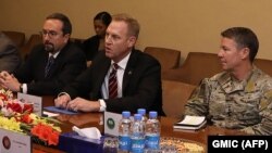 Acting Pentagon chief Patrick Shanahan (center) takes part in a meeting next to General Scott Miller (right), commander of U.S. and NATO forces in Afghanistan, and U.S. Ambassador to Afghanistan John Bass in Kabul on February 11.