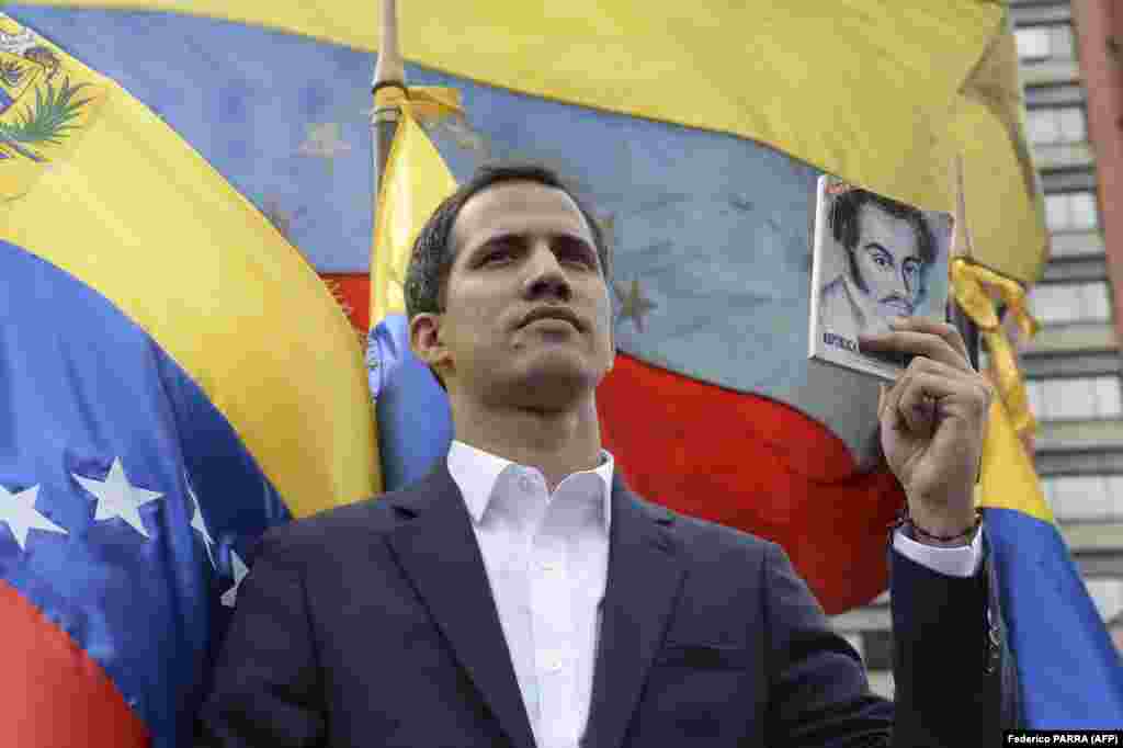 Juan Guaido, the head of Venezuela's National Assembly, declares himself the country's acting president during the mass protests on January 23. U.S. President Donald Trump said he recognized Guaido as interim president, prompting Maduro's government to break off diplomatic ties with Washington. 