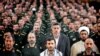 Former Iranian President Mahmoud Ahmadinejad (front row C) with commanders from the Basij Militia in Tehran May 7, 2006.