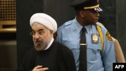 Iranian President Hassan Rohani departs after addressing the UN General Assembly in New York on September 24.