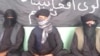 Unidentified Afghans claiming to represent a group called the Islamic Organization of Great Afghanistan, a purported militant organization they say is ready to fight for the Islamic State militant group.