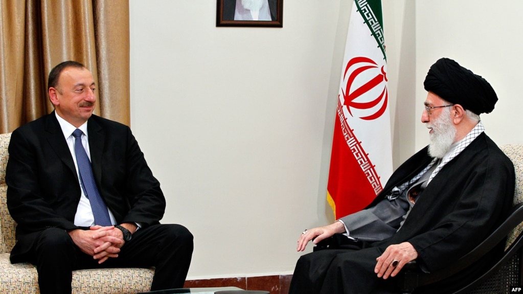 Iran's Supreme Leader Ayatollah Ali Khamenei (right) met with Azerbaijani President Ilham Aliyev in Tehran on March 5. (file photo)