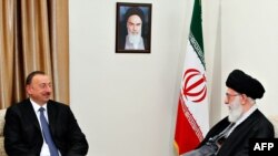 Ayətulla Ali Khamenei (sağda) və İlham Əliyev, 9 aprel, 2014-cü il