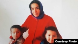 Maqsuda Alimardonova with her two sons, in a photo taken in May 2018