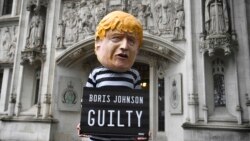 Anti-Breksit etirazçısı Boris Johnson-un maskasında Ali Məhkəmənin qarşısında piket keçirir