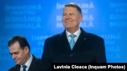 Președintele Klaus Iohannis și premierul Ludovic Orban, după anunțarea rezultatelor preliminare ale alegerilor