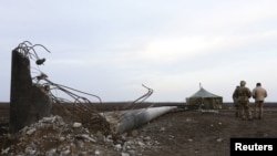 Взорванная опора ЛЭП, доступ к которой блокировали активисты акции по гражданской блокаде Крыма. 2015 год