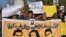 FILE: Pakistani human rights activists protest the disappearances.