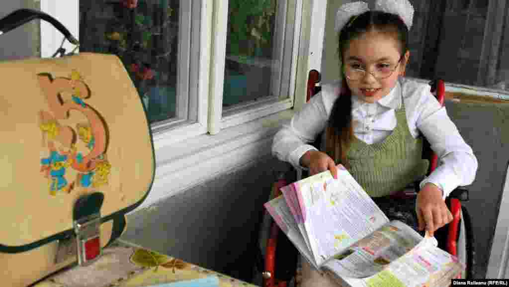 Nelea Lungu, 11, lives with her grandmother in the Moldovan village of Roscani. Her mother works in Moscow. Nelea wants to be able to go to school in her village, but the school has refused to admit her because of her disability.