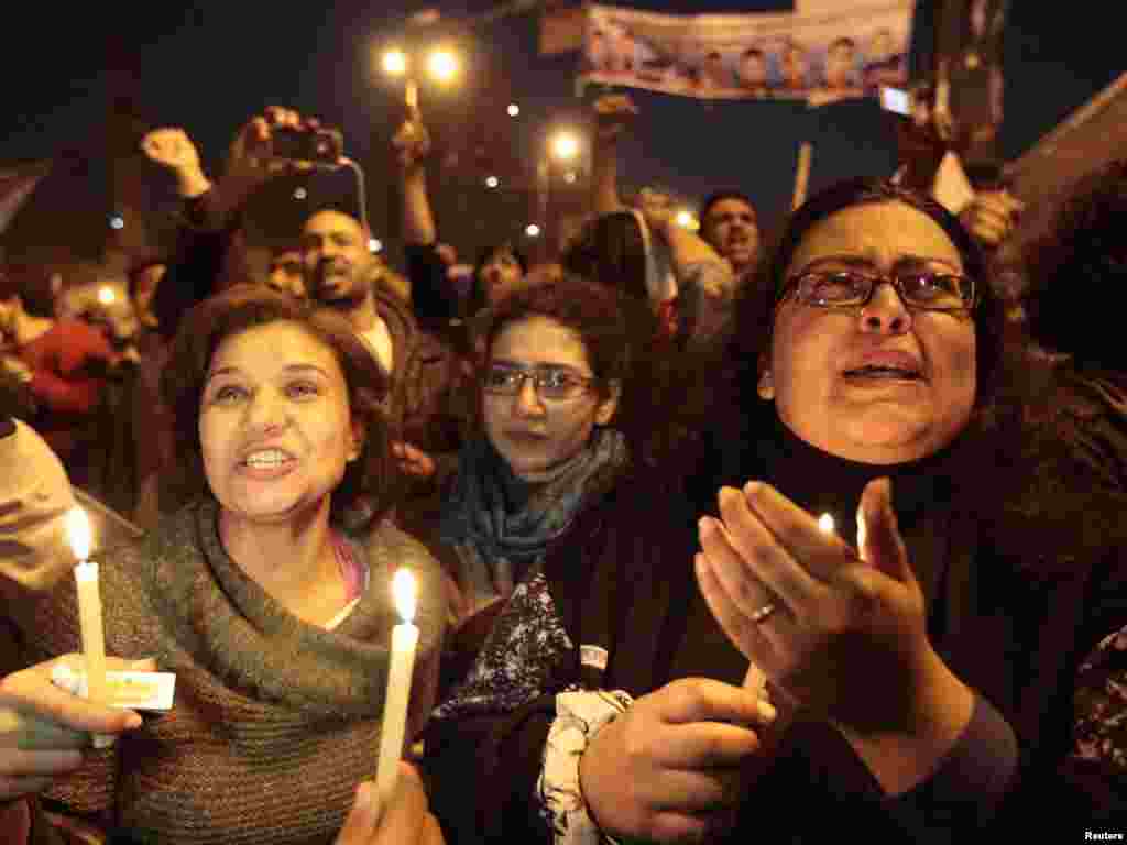 Protesters celebrate in Tahrir Square after the announcement of Mubarak&#39;s resignation on February 11, 2011.