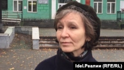 Yulia Razina says she understands why her husband killed himself. 