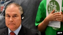 The head of the U.S. Environmental Protection Agency, Scott Pruitt, looks on during a meeting at the G7 environment summit in Bologna, Italy, on June 11.