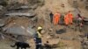 Armenia - Rescue teams work at the site of a powerful landslide, 3Oct2011.