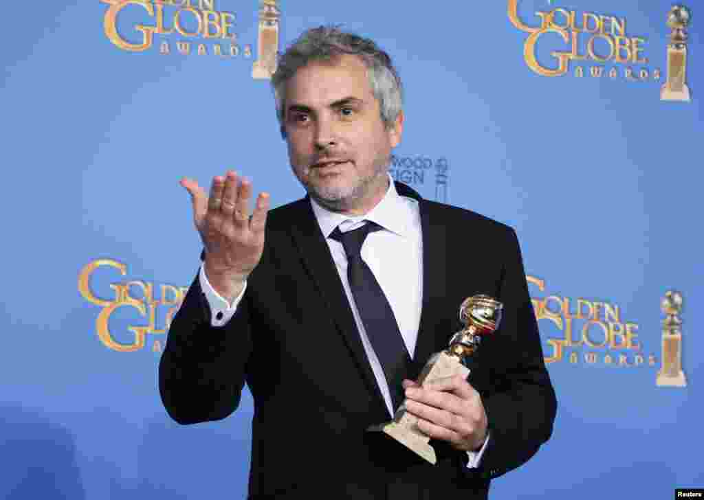Meksički reditelj Alfonso Cuaron proglašen je za najboljeg režisera za svoj svemirski triler "Gravitacija", 12. januar 2014. Foto: REUTERS / Lucy Nicholson 