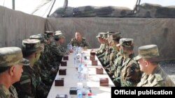 Azerbaijan - President Ilham Aliyev talks to soldiers serving in Agdam district east of Nagorno-Karabakh, 6Aug2014.
