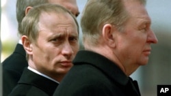 Russian President Vladimir Putin with his Belarusian and Ukrainian counterparts, Alyaksandr Lukashenka (left) and Leonid Kuchma, at a service marking the defeat of Nazi Germany near the southern Russian town of Prokhorovka in May 2000.