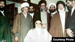 Ayatollah Rouhollah Khomeni with leaders of the Islamic Republic in the 1980s. Ali Khamenei standing behind him.