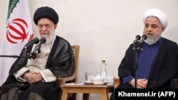 Iranian Supreme Leader Ayatollah Ali Khamenei and President Hassan Rouhani attend a cabinet meeting in Tehran, August 21, 2019
