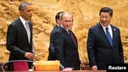 U.S. President Barack Obama (left), Russian President Vladimir Putin (center), and Chinese President Xi Jinping are all attending the APEC summit in Peru.