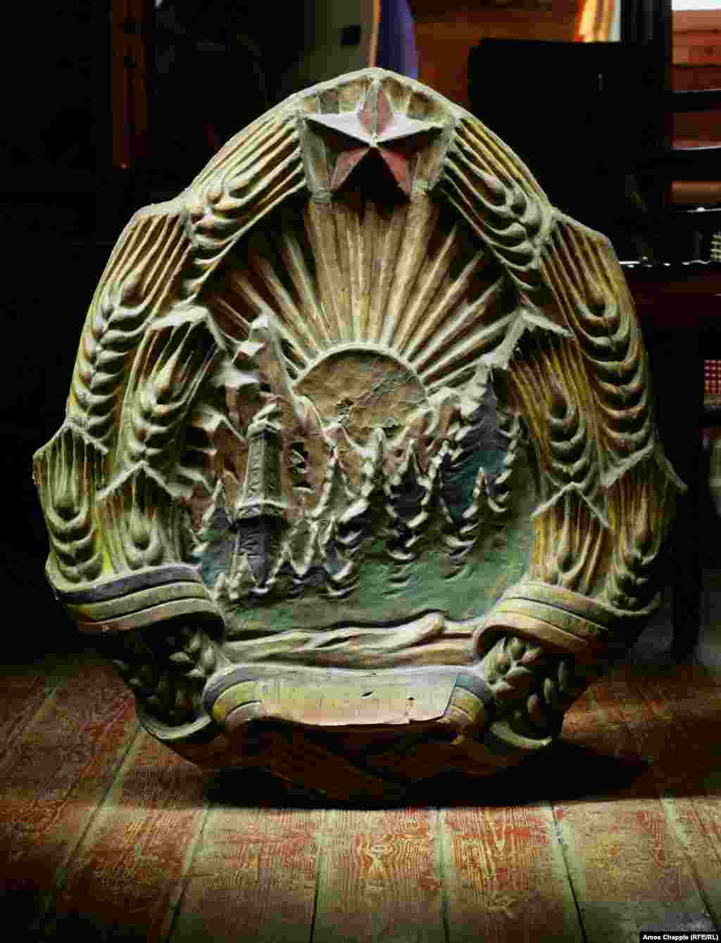 A cast of the coat of arms of socialist Romania. These are some of the thousands of relics of the country&#39;s communist past held in a basement in western Romania.