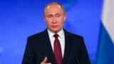 Владимир Путин во время выступления с ежегодным посланием. Фото ТАСС