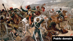 "Șarja cavaleriei ușoare" ("Charge of the Light Brigade"), tablou de Richard Caton Woodville (1897) comemorând un episod din Războiul Crimeei (1853-1856). 