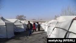 Residents of the village of Shark who lost their homes this summer still live in tents as temperatures drop.