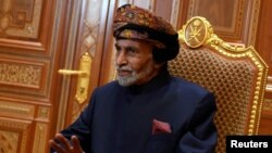 FILE PHOTO: Sultan of Oman Qaboos bin Said al-Said sits during a meeting with U.S. Secretary of State Mike Pompeo (not pictured) at the Beit Al Baraka Royal Palace in Muscat, Oman January 14, 2019. Andrew Caballero-Reynolds/Pool via Reuters/File Photo