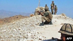 Pakistani troops hold their positions in Shingwari in South Waziristan.