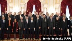 Participants of the NATO-Ukraine Commission pose for a picture after their talks in Kyiv.