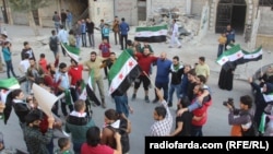 Демонстрация в Алеппо против окончания "гуманитерной паузы" в прекращении огня