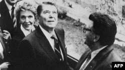 U.S. President Ronald Reagan tours the Berlin Wall before delivering his speech.