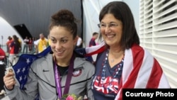 Georgia-born U.S. Paralympic swimmer Elizabeth Stone (left) with her adoptive mother, Linda, at the London 2012 Games.