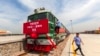 Railway workers prepare the first block train for departure from Shijiazhuang, China, to Moscow in the port in Hebei Province in June 2018, just one part of the sprawling Belt and Road Initiative.