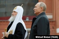 Putin si patriarhul Kirill.
