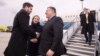 U.S. Secretary of State Mike Pompeo (center) is welcomed upon his arrival at Liszt Ferenc International Airport in Budapest on February 11.