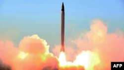 This undated picture released on October 11, 2015, by the Iranian Defense Ministry on their website reportedly shows the launch of an Emad missile during tests at an undisclosed location in Iran. Iran announced it had successfully tested the new domestically produced long-range missile, which it said was the first that could be guided all the way to targets. 