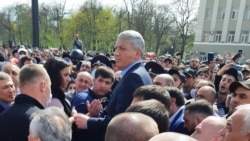 North Ossetian leader Vyacheslav Bitarov addresses people protesting against a coronavirus lockdown in Vladikavkaz on April 20.