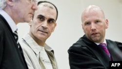 Shawan Sadek Said Bujak (center), an Iraqi Kurd and one of two men convicted of planning an attack on the Danish newspaper that printed controversial cartoons of the Prophet Muhammad in 2005, in an Oslo court in November.